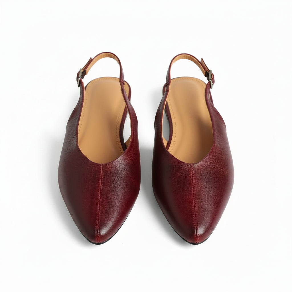 Wine red genuine leather pointed-toe flats, one pair shown with interior lining