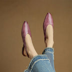 Mauve genuine leather pointed-toe flats with cream insole lining and low heel