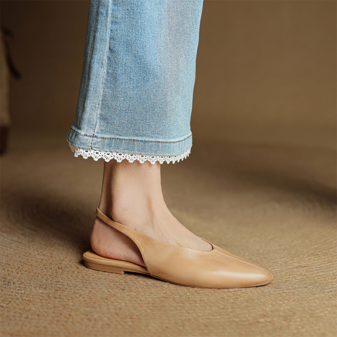 Beige genuine leather pointed-toe flats with smooth slip-on profile and slim sole