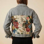 Floral patchwork denim jacket, back view, light blue denim with floral panels