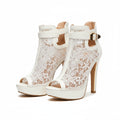 Ivory lace peep-toe platform heels with ankle strap and gold buckle