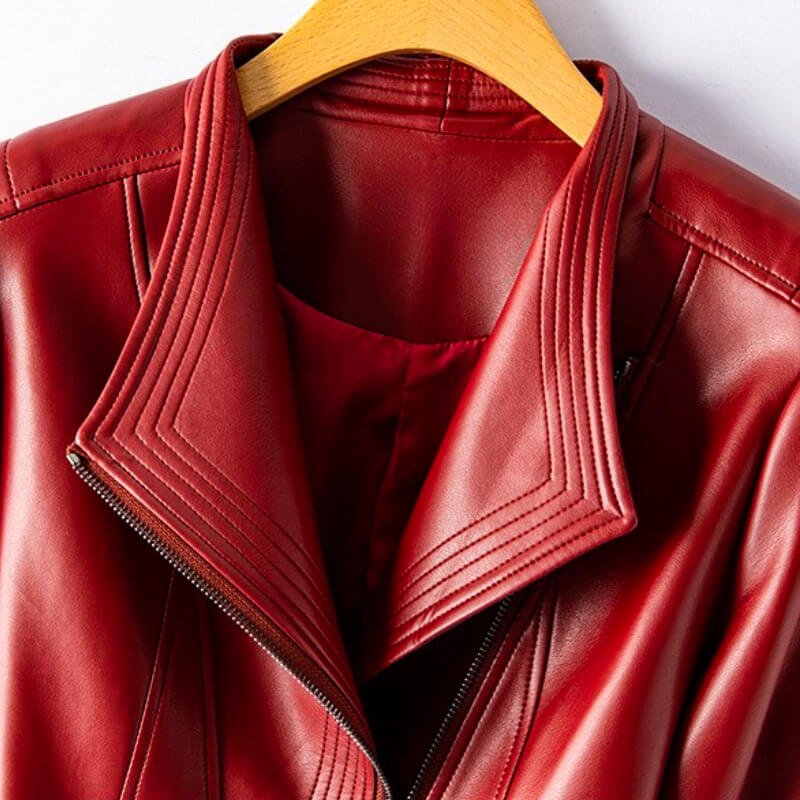 Crimson red leather jacket with ribbed stand collar and zip-front, close-up neckline