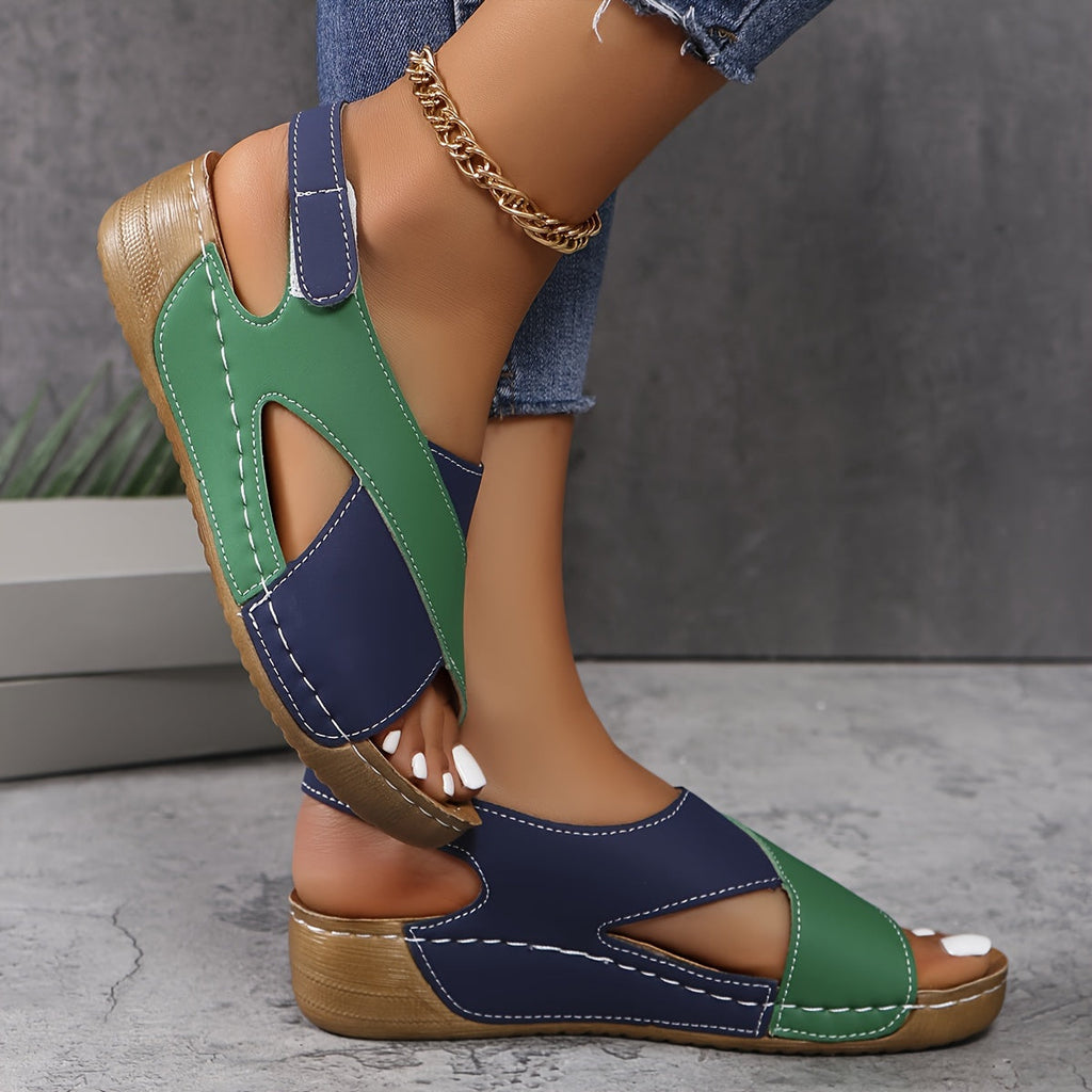 Green and navy orthopedic wedge sandal with open toe and cross-strap design