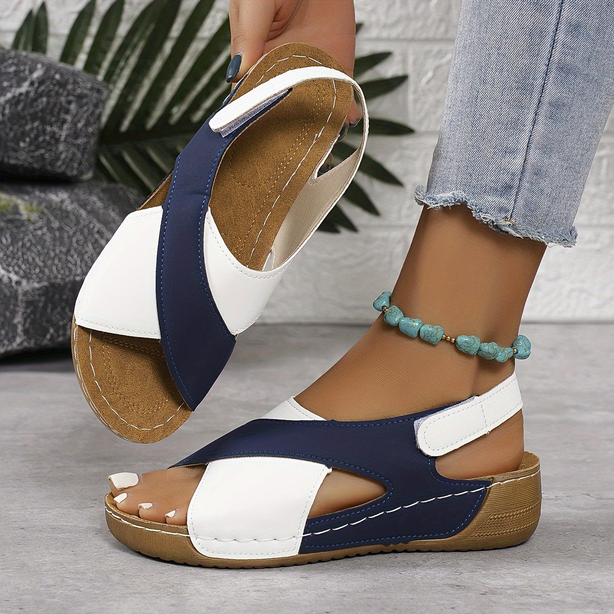 White and navy orthopedic wedge sandal with open toe and side strap