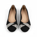 Black orthopedic flats with silver glitter strap across the toe, low wedge sole
