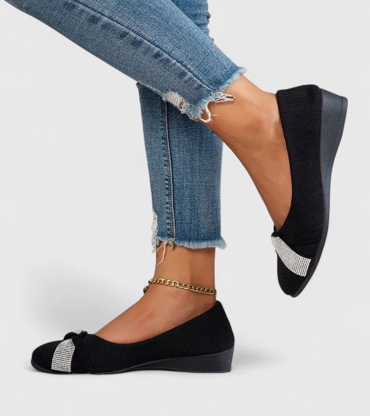 Black orthopedic flats with silver glitter strap, low wedge sole profile