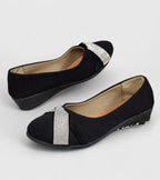 Black orthopedic flats with rounded toe and silver glitter strap, low wedge sole