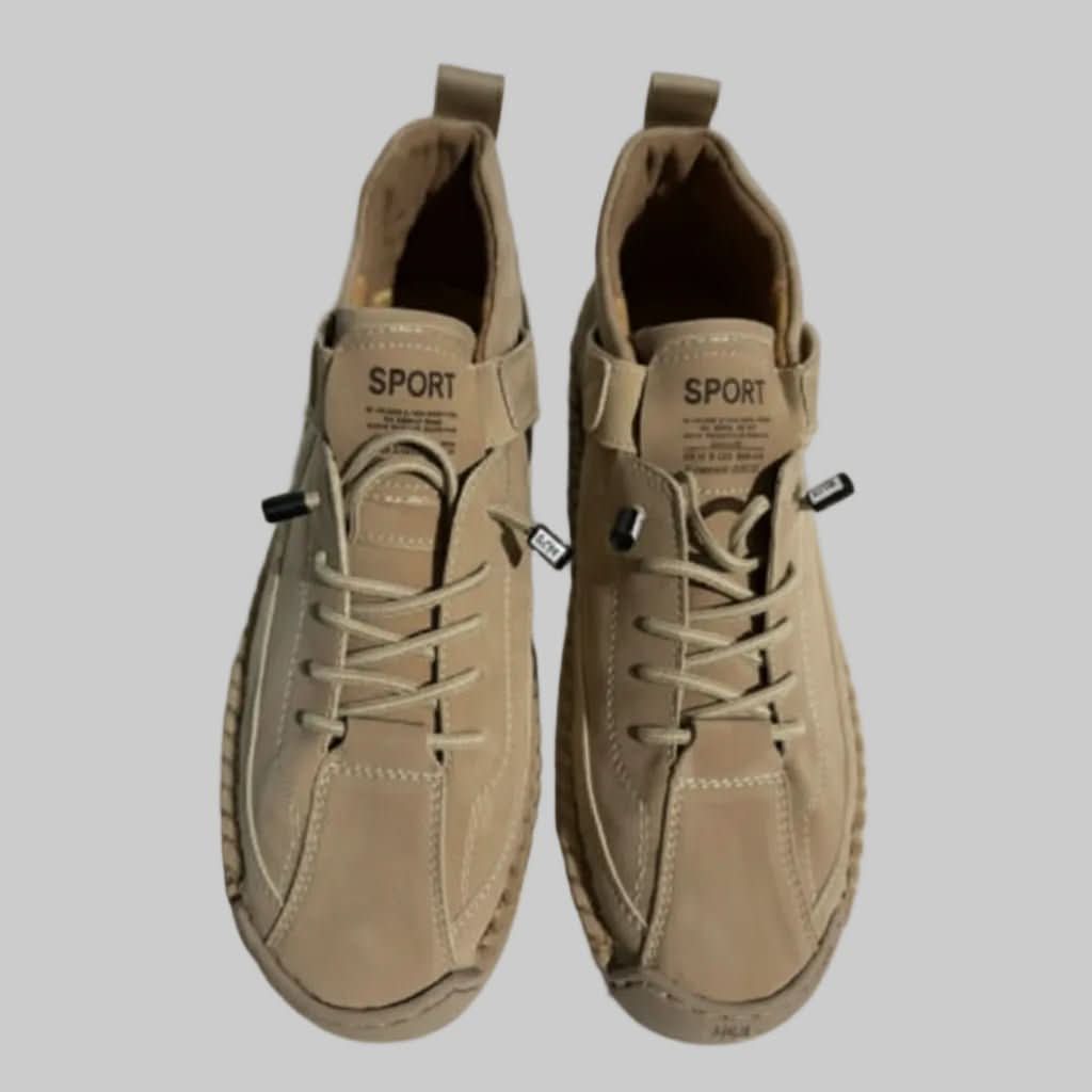 Lightweight walking sneakers in tan with lace-up front and SPORT label on tongue.