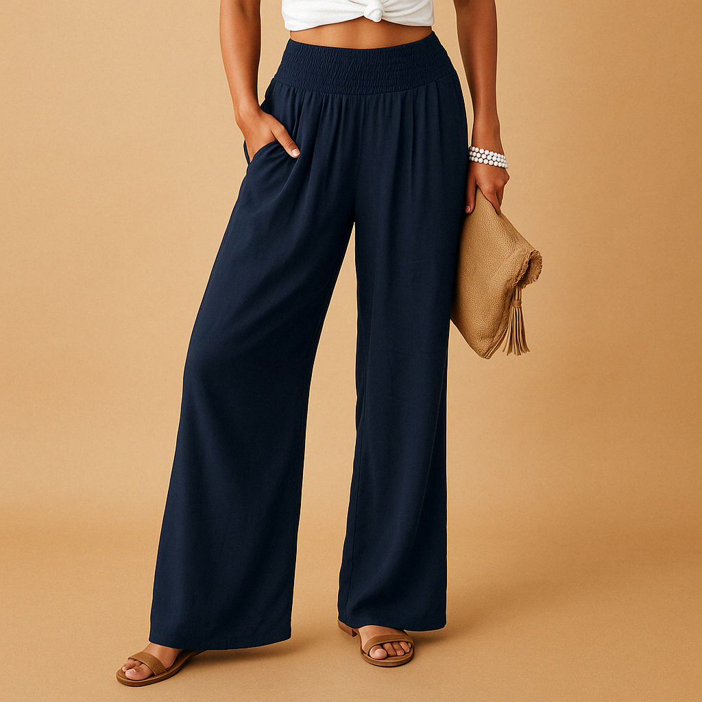 Navy high-waisted wide-leg trousers with elastic waistband and relaxed, straight legs