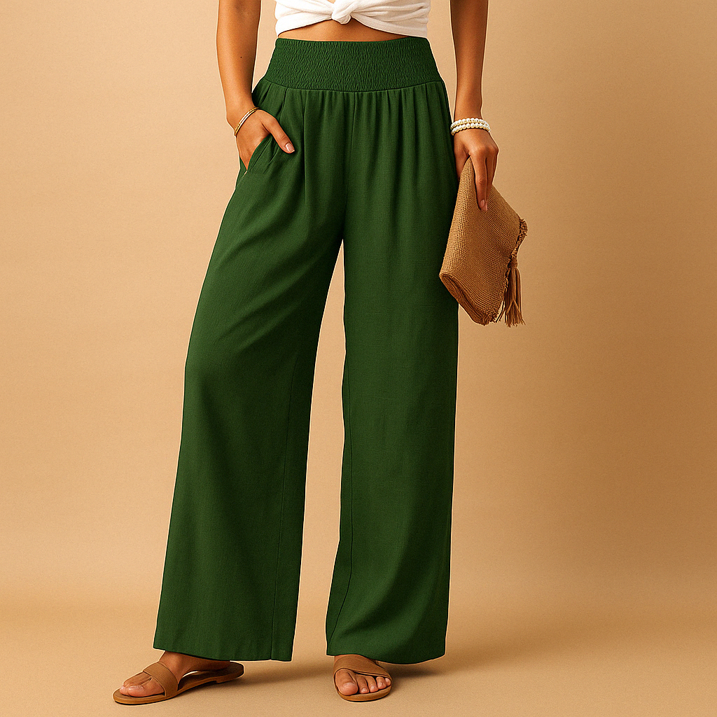Dark green high-waisted wide-leg trousers with elastic waist and roomy wide silhouette