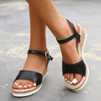 Black platform wedge sandals with two straps and open toe