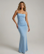 Light blue spaghetti-strap maxi dress with ruched detailing and long fitted mermaid shape