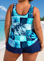 Plus size swim tank and shorts set, bright blue tropical print with navy shorts, back view