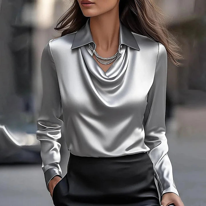 Silver satin blouse with draped V neckline, pointed collar, long sleeves