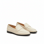 Beige leather loafer with side strap and low black sole