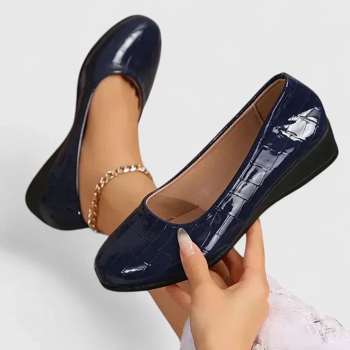 Orthopedic flats, navy blue glossy croc-embossed look with rhinestone ankle chain