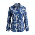 Blue-and-white geometric print collared button-up blouse with rolled sleeves