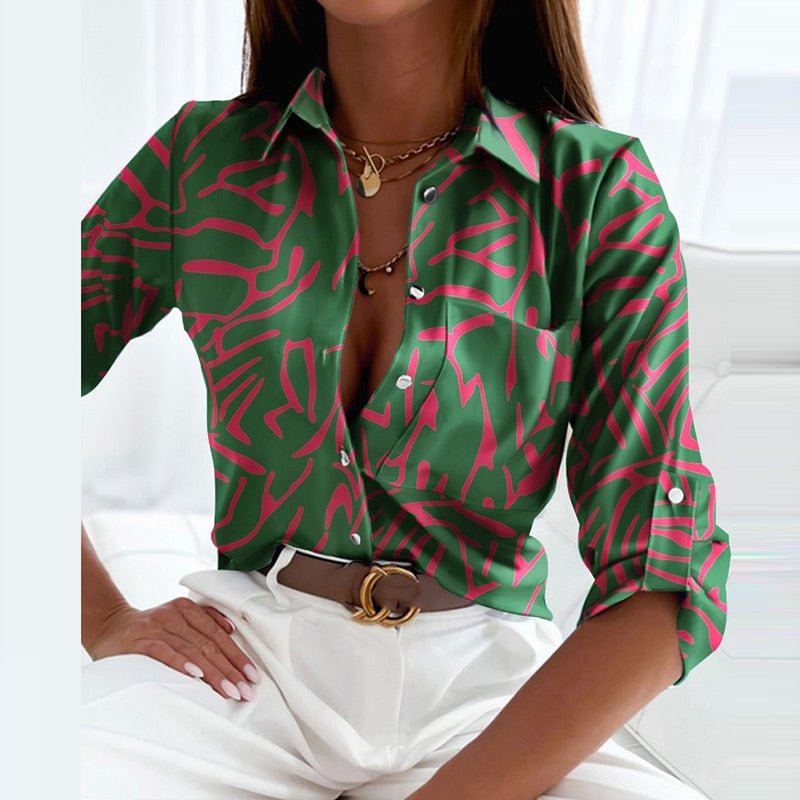 Green button-front collared blouse with pink abstract line print and 3/4 sleeves