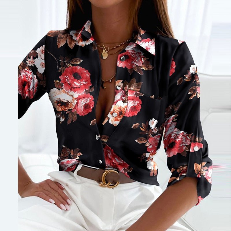 Black floral print collared button-up blouse with long sleeves
