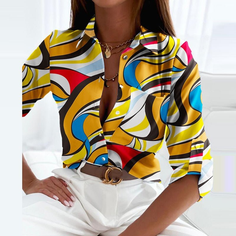 Yellow, blue, and red abstract print collared button-up blouse with long sleeves