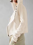 Cream waffle-knit zip hoodie with hood, side view, front zip and snap placket