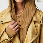 Tan waffle hoodie with zip front and hood, layered close-up view