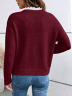 Burgundy French-collar knit blouse with ruffled V neckline and long sleeves