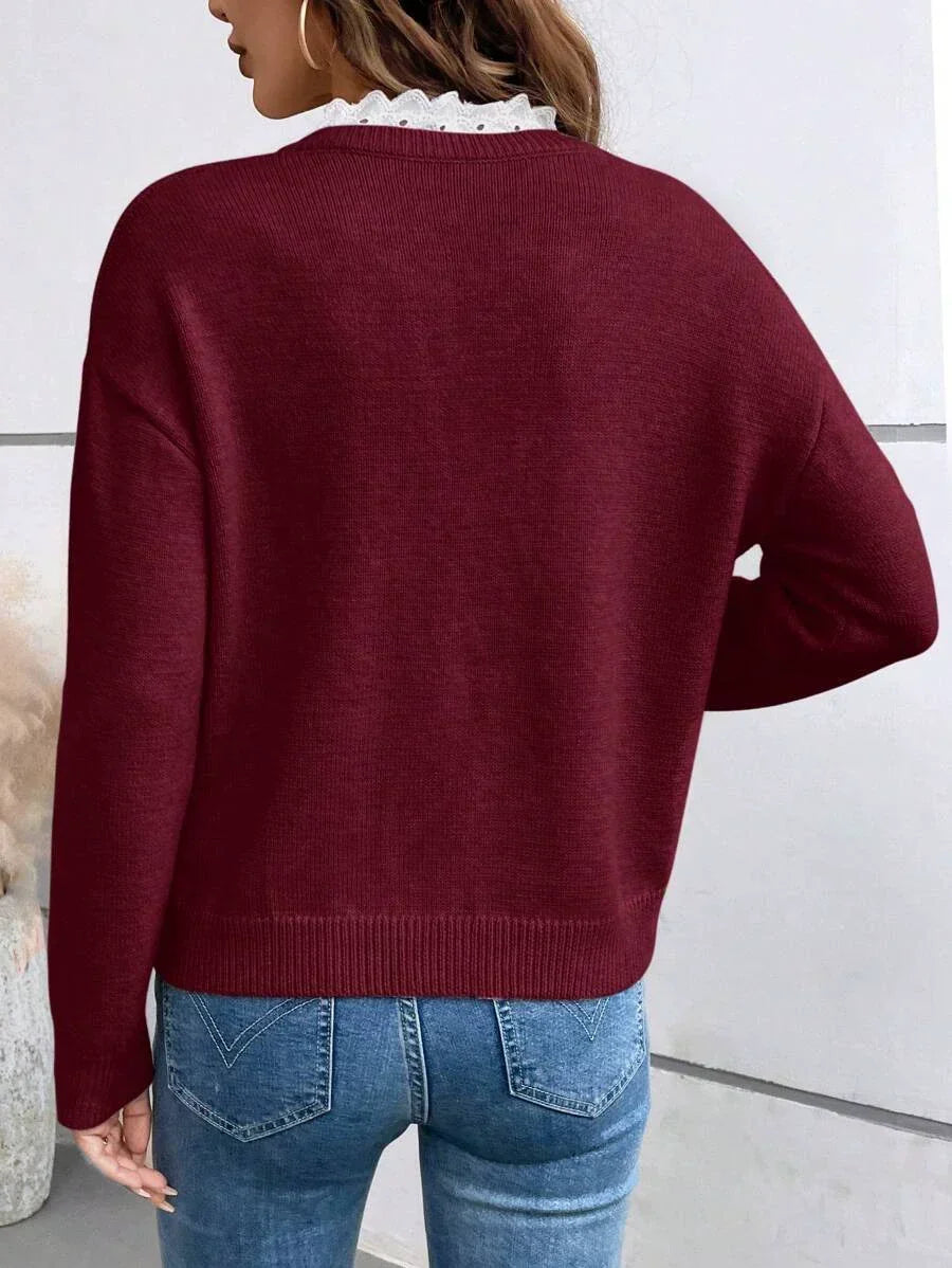 Burgundy French-collar knit blouse with ruffled V neckline and long sleeves