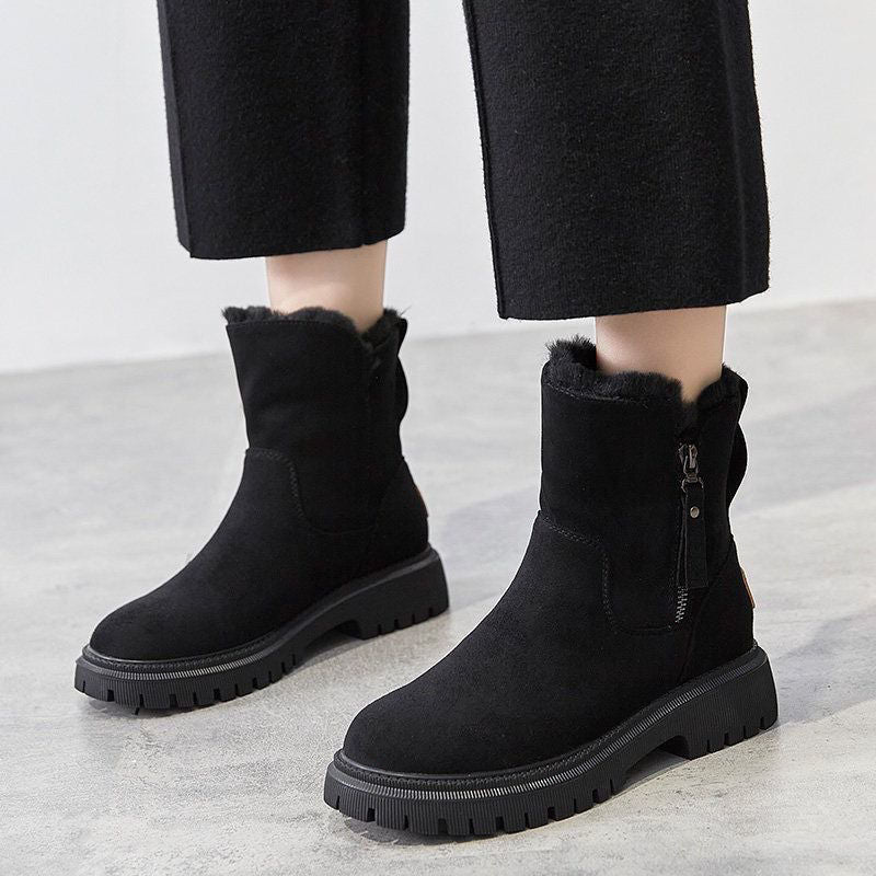 Black suede winter boots with faux-fur lining, side zipper, chunky non-slip sole