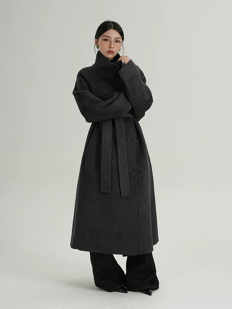 Black-gray funnel-neck wool cocoon coat with waist tie belt and button closure
