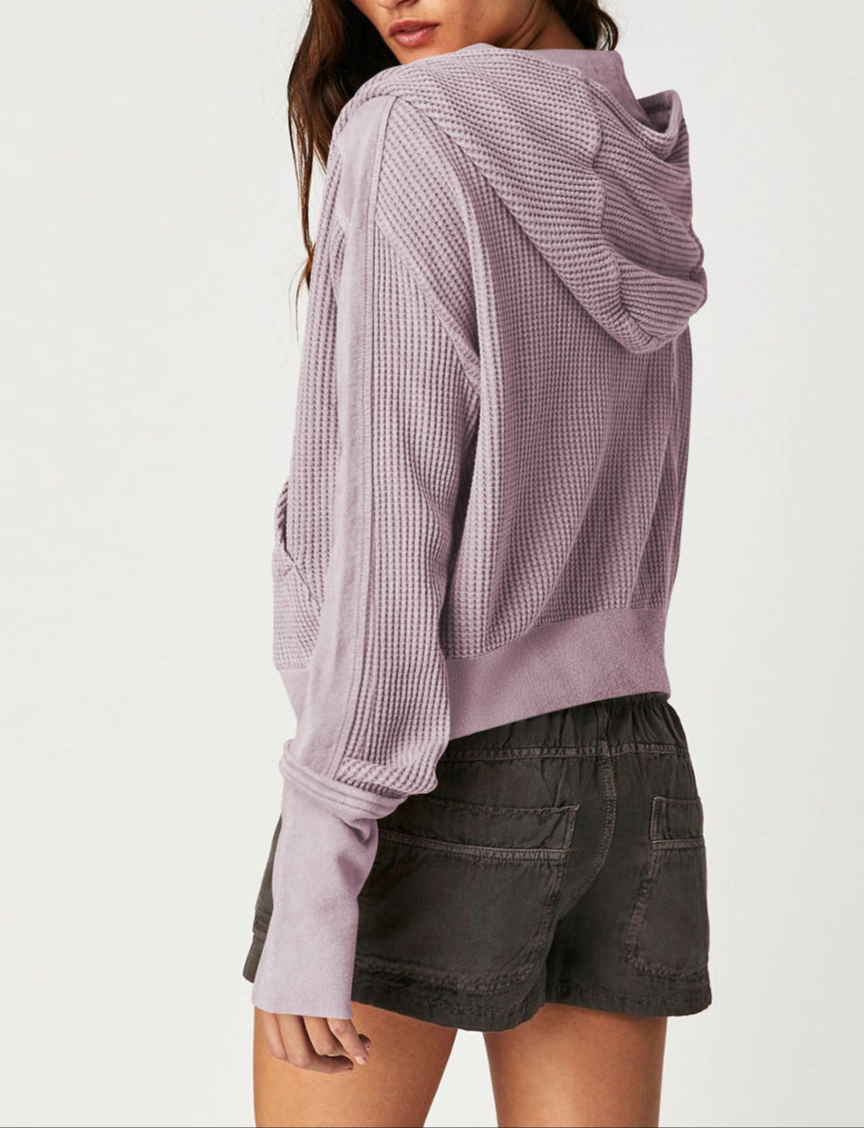 Lavender waffle zip hoodie with drawstring hood, shown from the side.