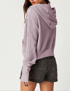Lavender waffle zip hoodie with drawstring hood, shown from the side.