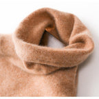 Camel-brown turtleneck knit sweater neckline close-up with soft rib edge