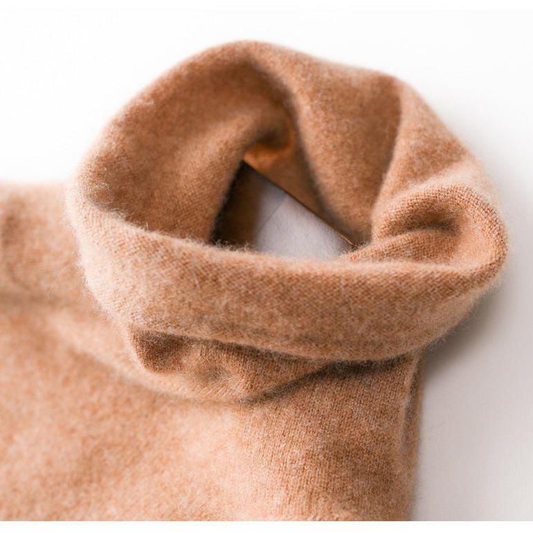 Camel-brown turtleneck knit sweater neckline close-up with soft rib edge