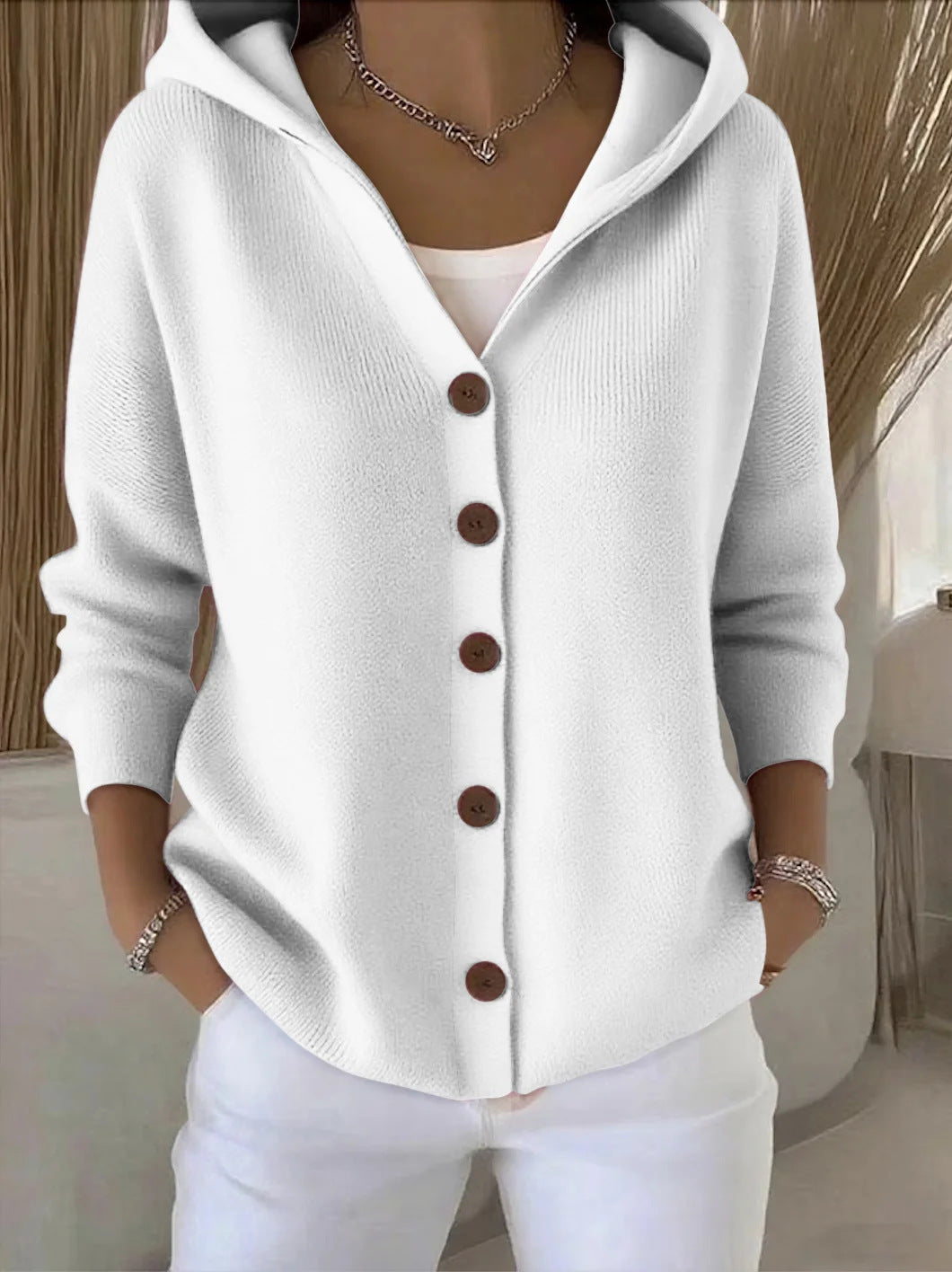 Soft hooded knit cardigan in white with button front and ribbed cuffs