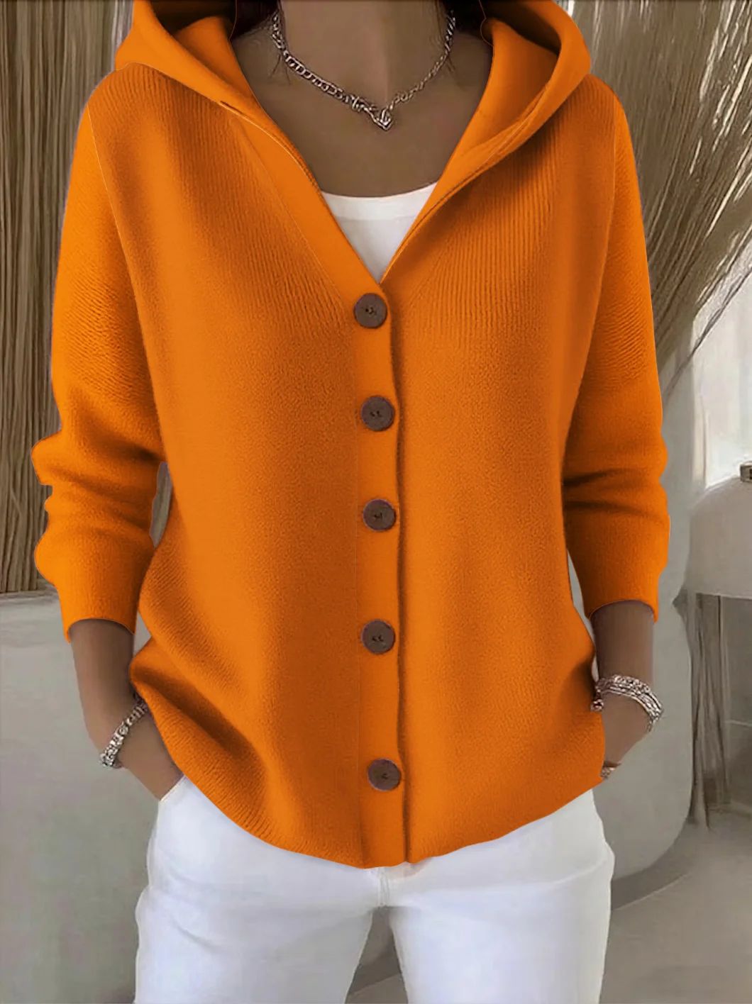 Soft hooded knit cardigan in orange with button front and ribbed cuffs