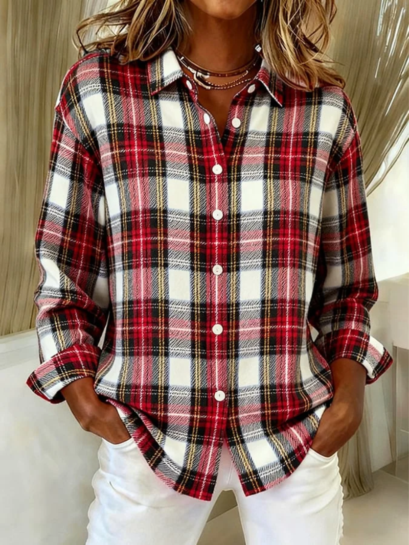 Red, black, and white plaid button-up knit blouse with pointed collar and white buttons