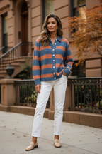 Blue-and-orange striped knit blouse with collar, button front, and white buttons.