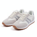 Orthopedic comfort sneakers in white with gray stripes and lace-up design, gum sole