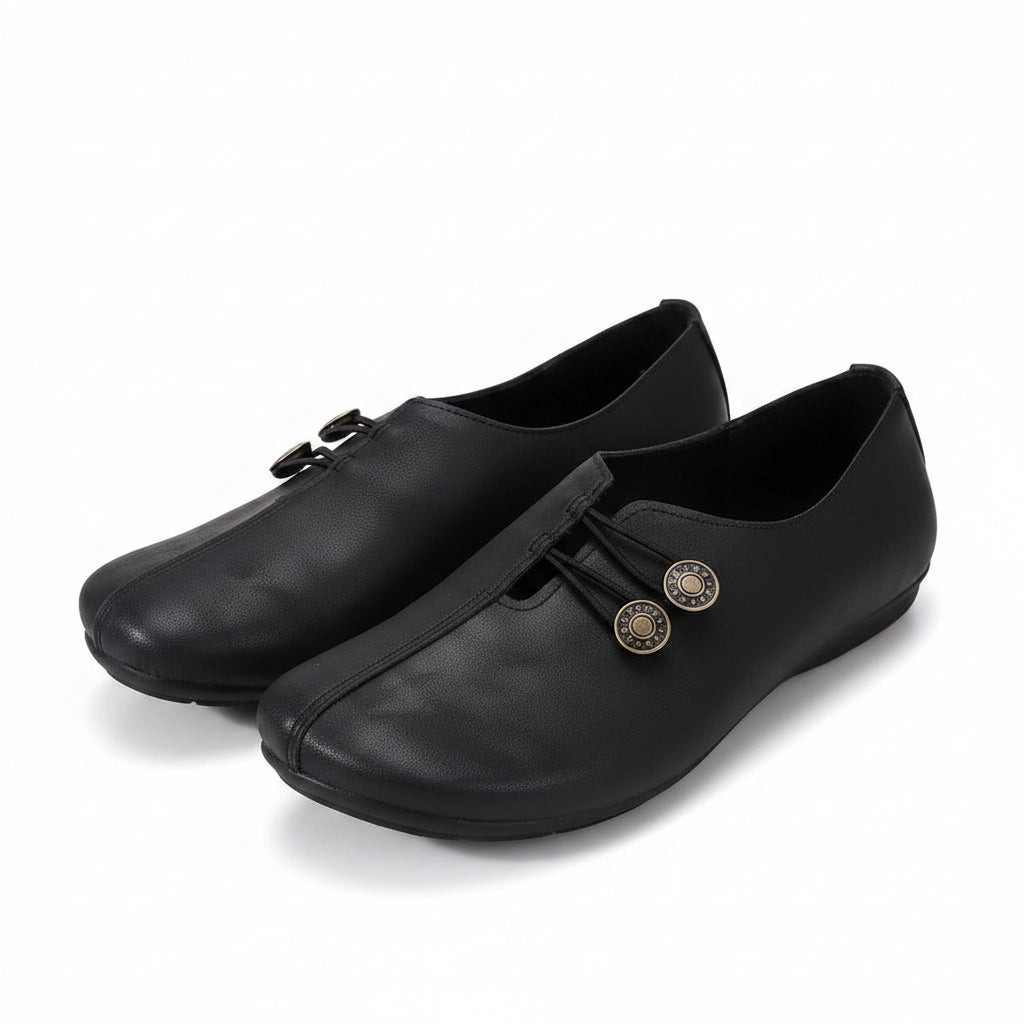 Women’s lightweight walking shoes in black with lace-up front and round coin eyelets