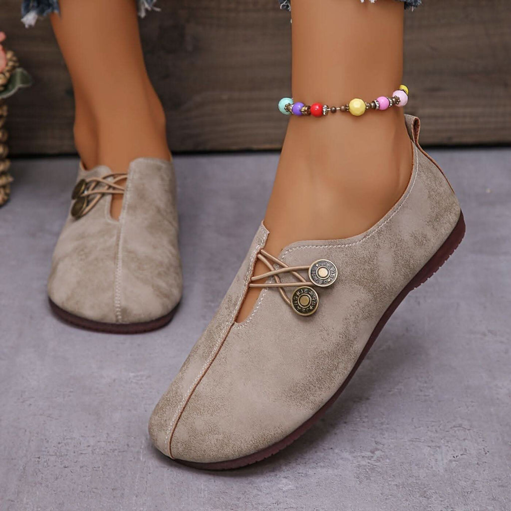 Women’s lightweight walking shoes in light beige suede with lace-up and round button detail