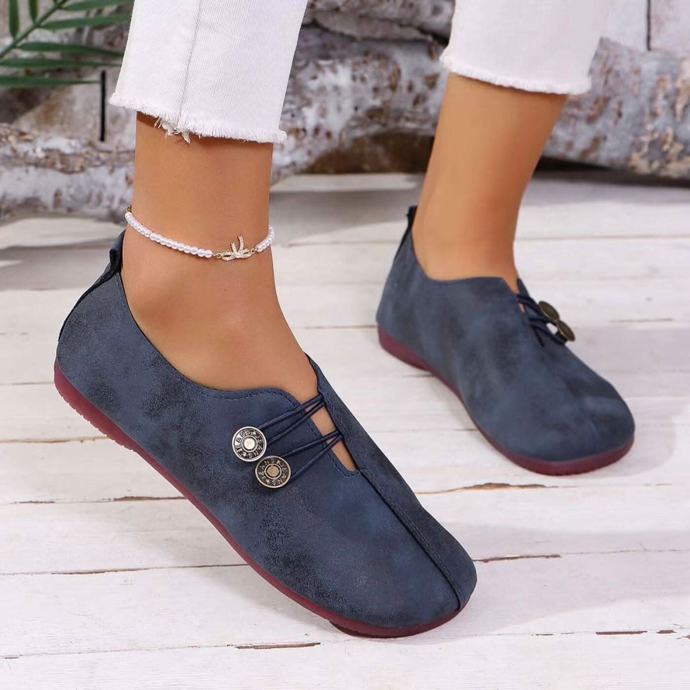 Women’s lightweight walking shoes in navy suede with lace ties and round coin buttons