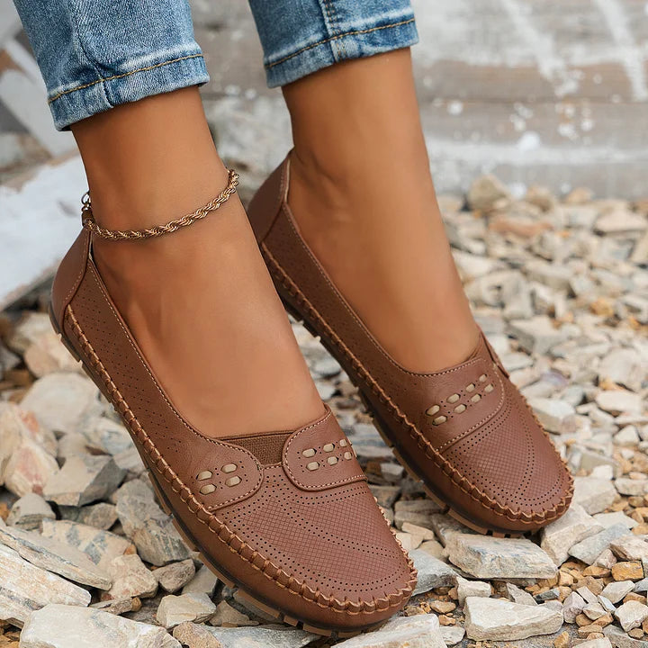 Women’s lightweight comfort loafers, brown perforated slip-on with chain ankle bracelet