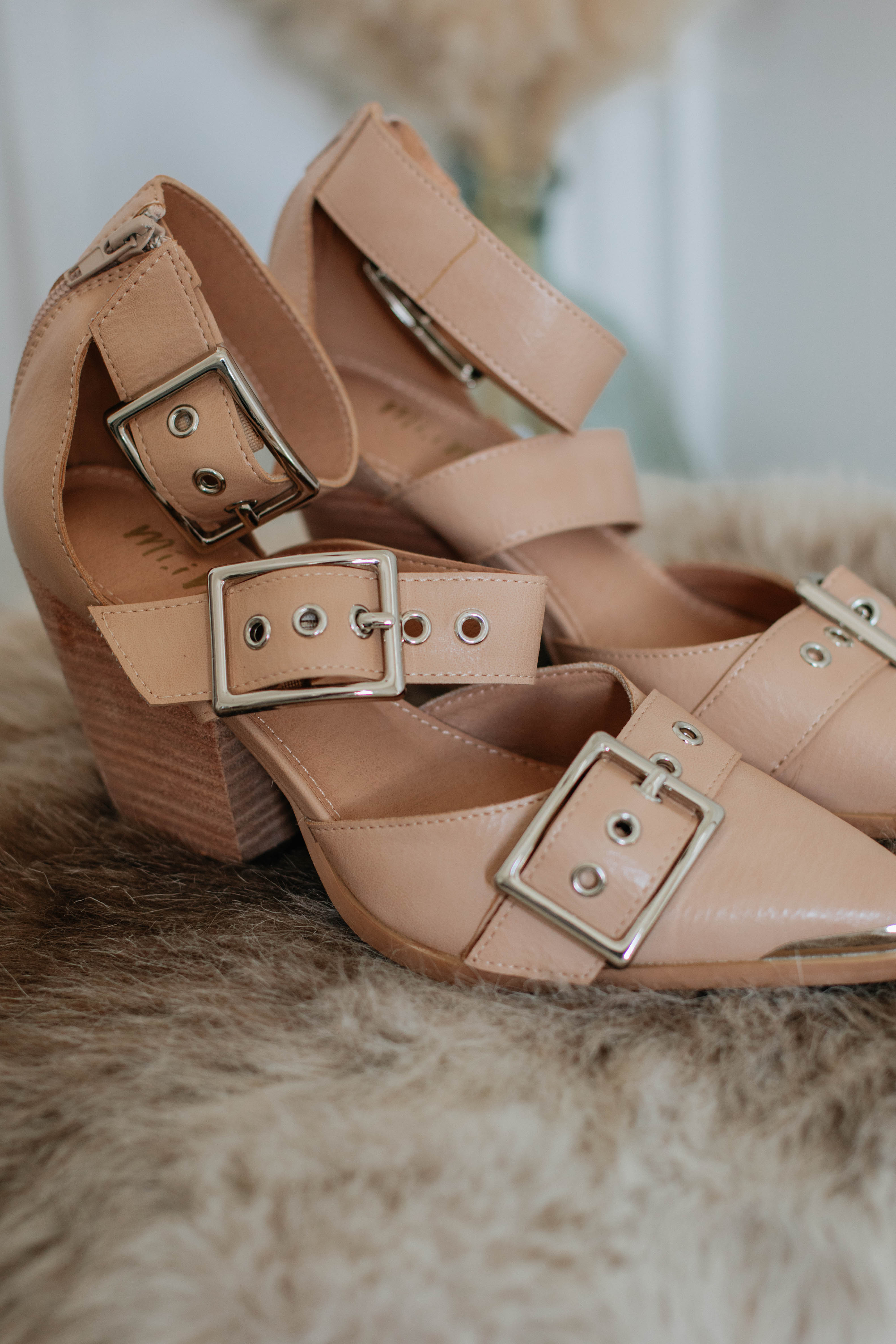 Beige block-heel sandals with wide straps and silver square buckles