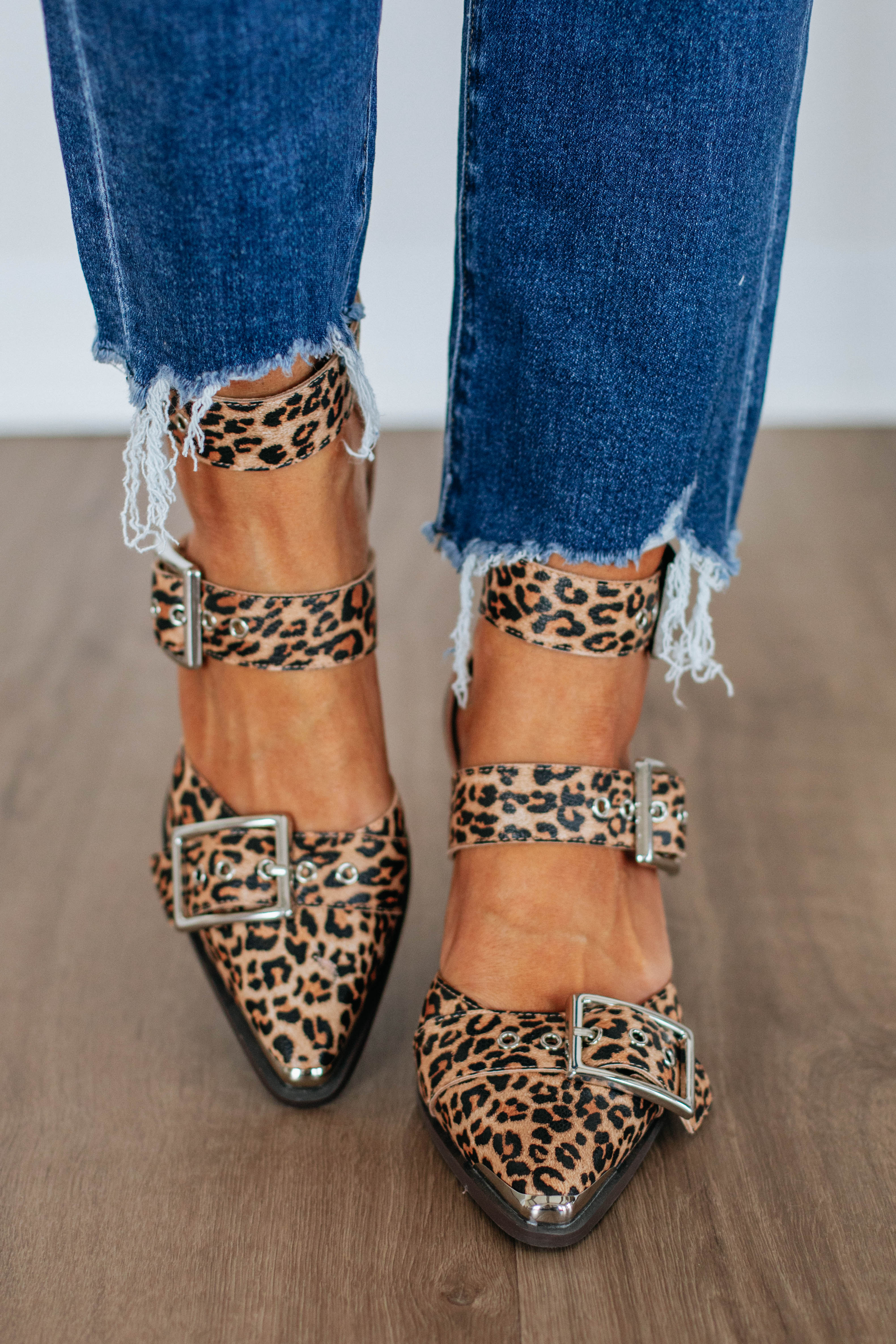 Leopard print heeled sandals with square buckle details and block heel, pointed toe