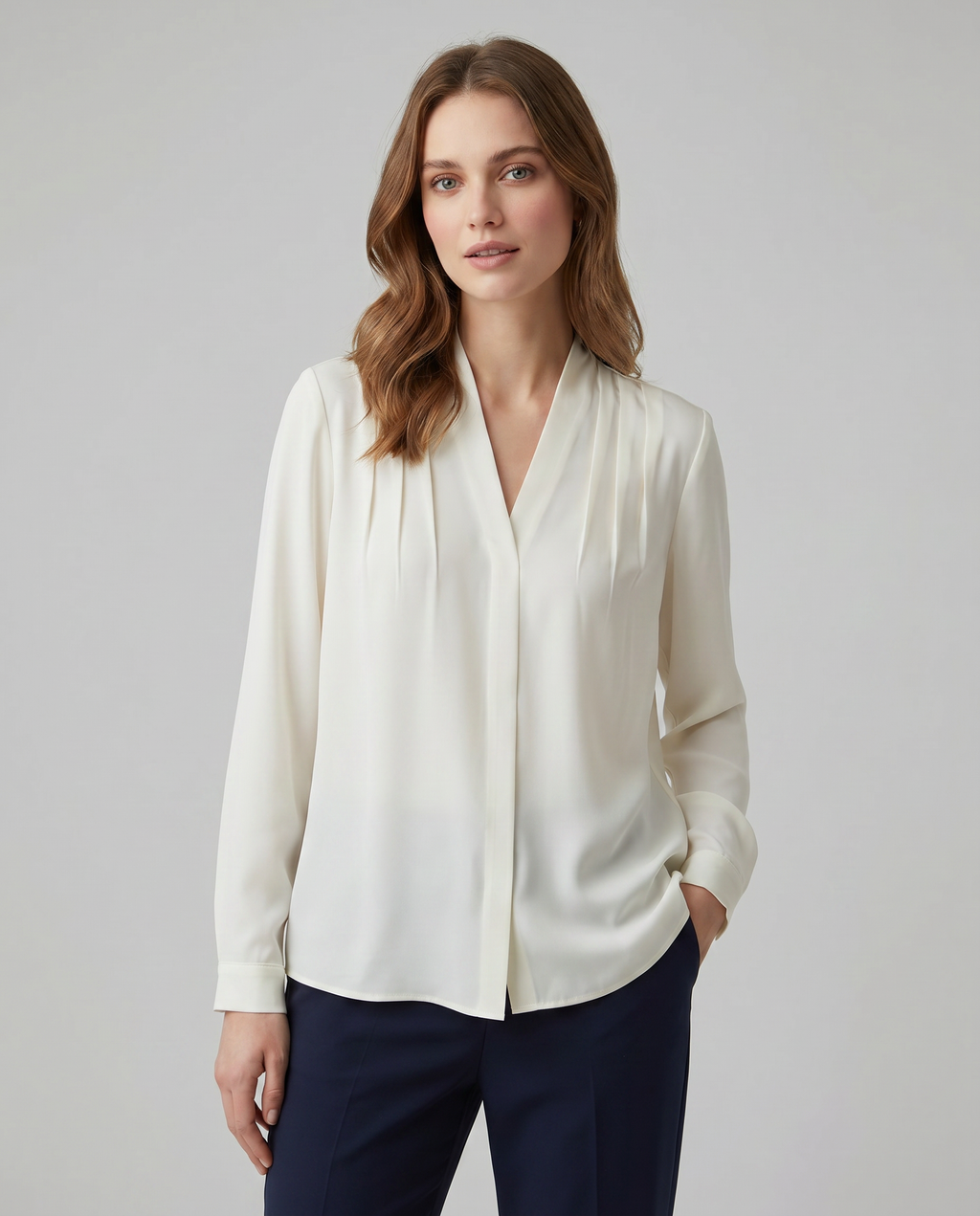 Ivory V-neck blouse with puff sleeves and tailored defined waist