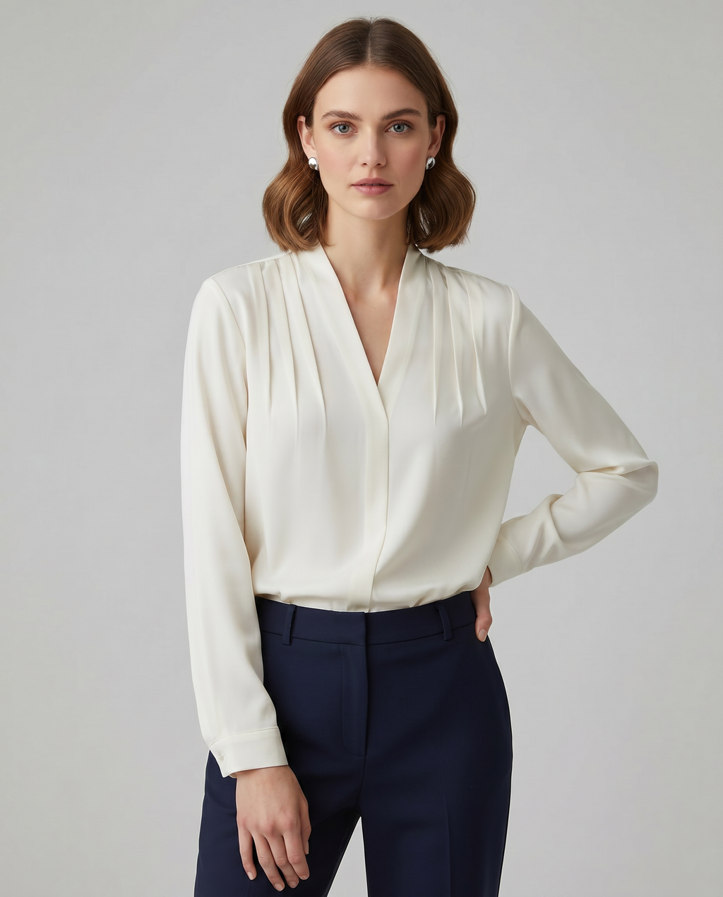 Ivory V-neck blouse with gathered puff sleeves and fitted waist