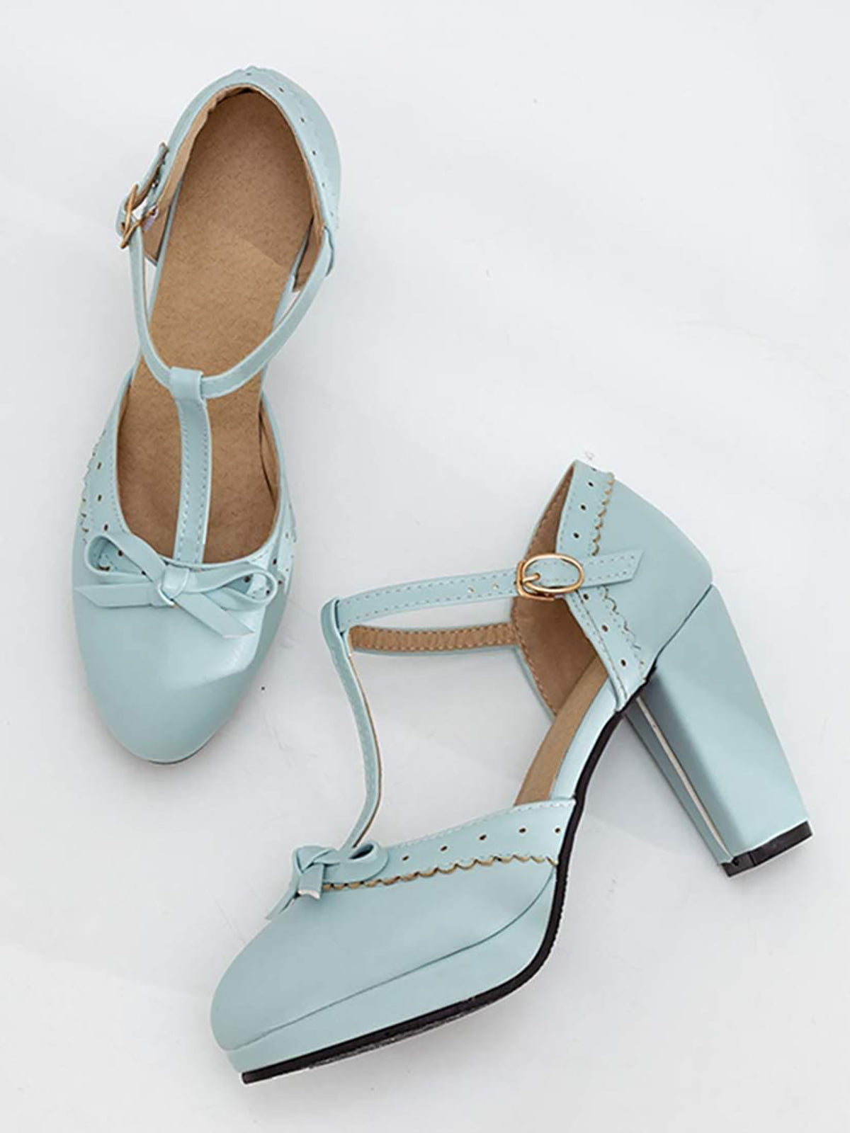 Sky blue T-strap high heels pair with bow accents and ankle strap buckle