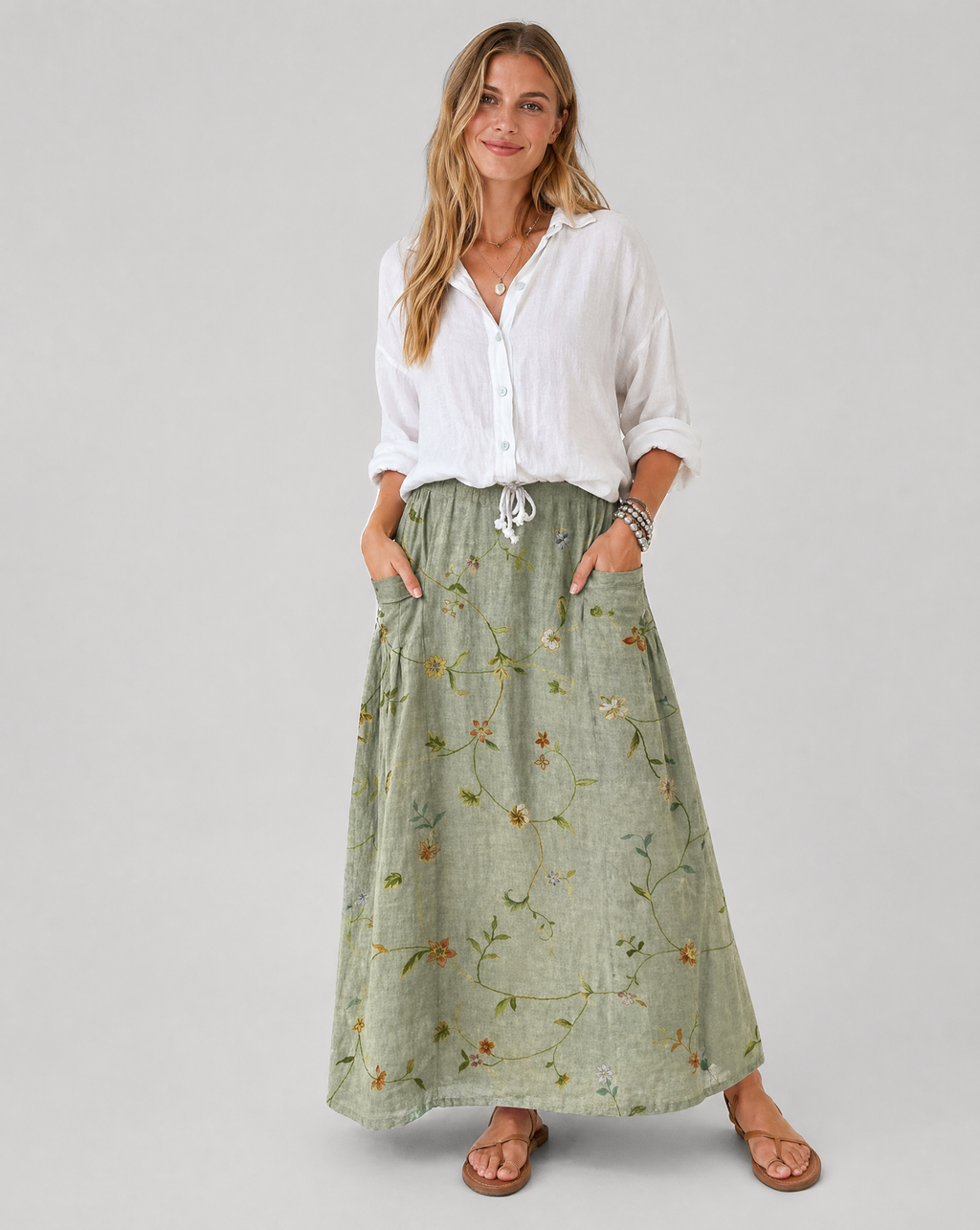 Sage green floral A-line skirt with side pockets, full maxi length