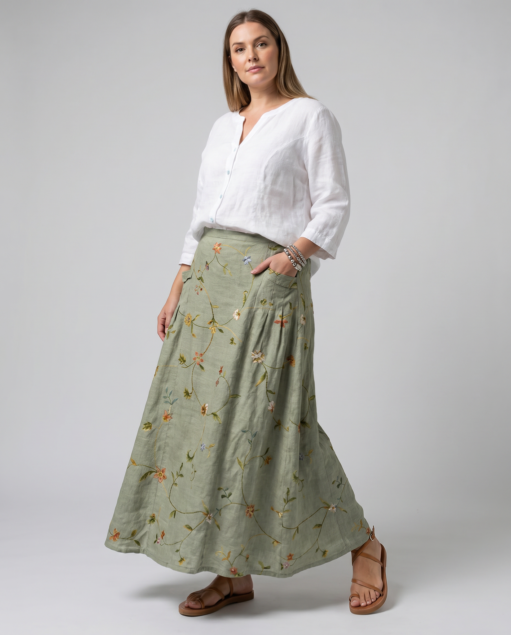 Sage green floral maxi A-line skirt with side pockets and elastic waistband
